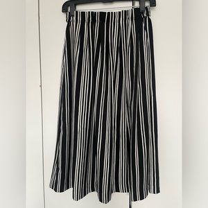 H&M high waisted Striped pleated knee length skirt.
